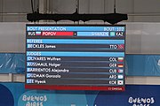 Deutsch: Boxen bei den Olympischen Jugendspielen 2018 Tag 12, 18. Oktober 2018 - Finale im Leichten Weltergewicht Jungen – Ilia Popov (Russland, rot) schlägt Talgat Shaiken (Kasachstan, blau) 4-1; Ringrichter ist James Beckles (Trinidad und Tobago). English: Boxing at the 2018 Summer Youth Olympics on 18 October 2018 – Final Light Welterweight Boys Bout - Ilia Popov (Rusia, rojo) supera a Talgat Shaiken (Kazajstán, azul) 4-1; Referee is James Beckles (Trinidad and Tobago). Español: Boxeo en los Juegos Olímpicos Juveniles de Verano de 2018 en 18 de octubre de 2018 - Chicos de peso welter ligero final: Ilia Popov (Uzbekistán, roja) le gana a Talgat Shaiken (Egipto, azul) 4-1; El árbitro es James Beckles (Trinidad y Tobago).