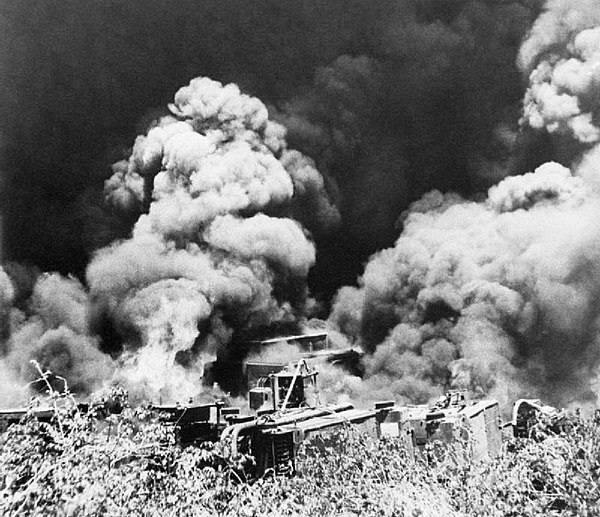 British troops destroy equipment and machinery at the Yenangyaung oilfields in Burma before retreating, 16 April 1942. IND989.jpg