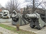 A Romanian M1891 on a garrison mount (right).