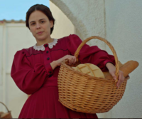 Imagen de la película Petra de San José que refleja la caridad de la protagonista.