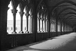 Winter view of the loggiato on the first floor of the south-western side with the four-light windows Castello Visconteo BN.JPG