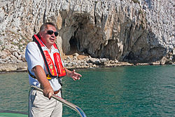 Prof. Clive Finlayson delivering a short talk for Gibraltarpedia just off Vanguard Cave. Clive Finlayson off Vanguard Cave.jpg