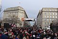 A crowd of people walking south toward the Orange Gate to get into the US Capitol area during the 2013 US Presidential Inauguration. Taken on First St. NW between C St. NW and Louisiana Ave. NW.