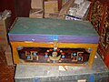 Decorated wooden Tibetan Buddhist trunk