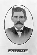 Most-often reproduced "Doc Holliday" photo; heavily retouched oval-inscribed portrait with cowlick and folded-down collar.