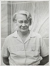 Australian geologist Dorothy Hill Dorothy Hill, later in life, standing before a sandstone wall.jpg