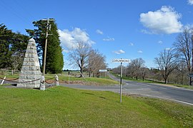 Drummond Town Entry Sign and War Memorial.JPG