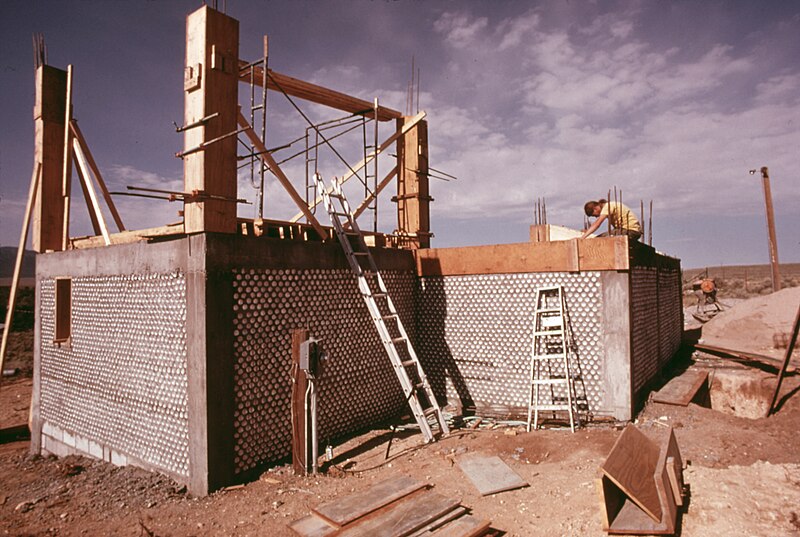 File:EXTERIOR OF AN EXPERIMENTAL ALL ALUMINUM BEER AND SOFT DRINK CAN HOUSE UNDER CONSTRUCTION NEAR TAOS, NEW MEXICO. THIS... - NARA - 556642.jpg