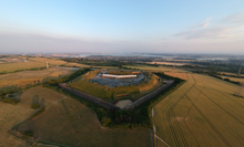 Fort Nelson at Portsmouth, one of the Palmerston Forts built in the United Kingdom in the 1860s. Fort Nelson, Portsdown Hill, look from south, 5-7-2018.png