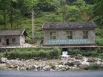 Hongping Power station, in Hongping Town, Shennongjia, has a design typical for small hydro stations in the western part of China's Hubei Province. Water comes from the mountain behind the station, through the black pipe seen in the photo