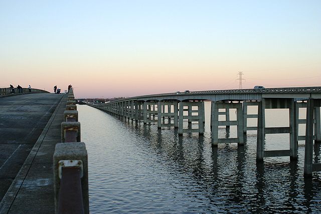 I-95 bridge over Lake Marion, Santee, South Carolina; the old bridge (on the left) was abandoned and converted to a fishing pier, but is now closed ev