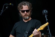 Snider vystupuje s Minus the Bear v roce 2014