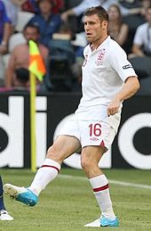 Milner playing for England at UEFA Euro 2012 James Milner - Patrice Evra 20120611 (2) (crop).jpg