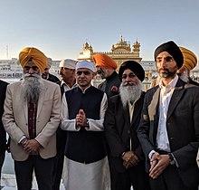Khan on a visit to Amritsar, India in 2018 Jasvir Singh OBE accompanying the Mayor of London Sadiq Khan to the Golden Temple in Amritsar, India.jpg