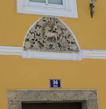 House N°36. Gothic stone with mystic lamb.