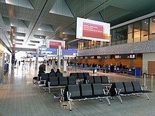Luxembourg's international airline Luxair is based at Luxembourg Airport, the country's only international airport. LUX Check-In Schalter.jpg
