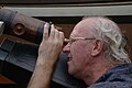 2009-09-12 14:25 Dad looking through a telescope.