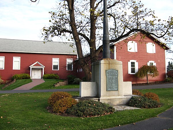 "The Barn," MPH's performing arts building; St. John's Academy memorial (foreground).