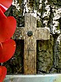 Memorial cross affixed to the war memorial oak tree in Bexley Woods, Bexley.