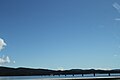 Given info: Travel to Sweden by car. Result: The bridge in this picture turned out to be Mjøsbrua over the lake Mjøsa in Norway.