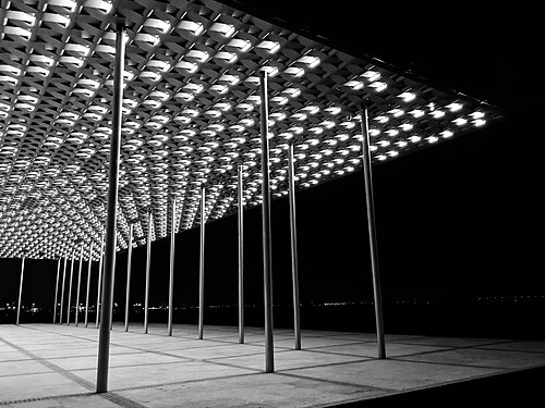 A modern pier at night in Bahrain