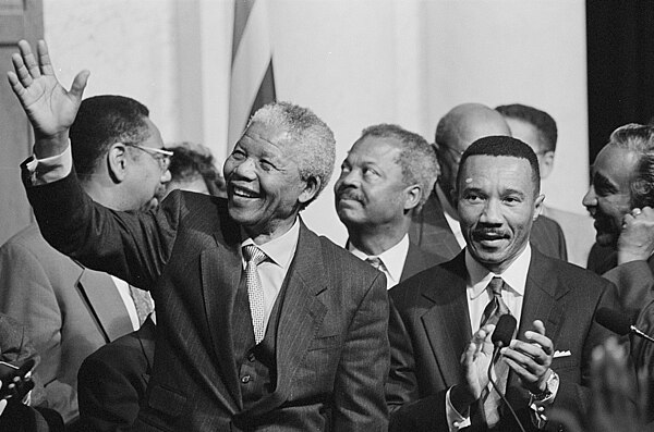 Mfume with Nelson Mandela in 1994