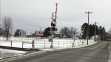 Shows the level crossing of Norfolk Southern's New Holland Secondary over Peters Road in New Holland, Pennsylvania. New Holland Secondary over Peter's Road.png