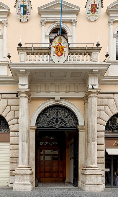 The entrance of the Pontificia Accademia Ecclesiastica. The coat of arms on the left is that of Cardinal Sodano, Cardinal Protector of the PEA.