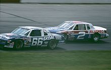 Wallace in the No. 2 (background) in 1985 PhilParsonsRustyWallace1985.jpg