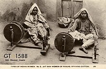 Photograph of Jat Sikh women captioned 'Types of Indian Women. No. 3, Jat Sikh Women of Punjab, Spinning Cotton. 85', 1912. No. 85 in the photograph series within the source. Photograph of Jat Sikh women captioned 'Types of Indian Women. No. 3, Jat Sikh Women of Punjab, Spinning Cotton. 85', 1912.jpg