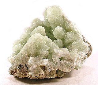 Prehnite transitional ino-phyllosilicate mineral