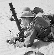 Rhodesian troops of the 60th King's Royal Rifles training with a 2-inch mortar in North Africa, 12 May 1942. E11699.jpg