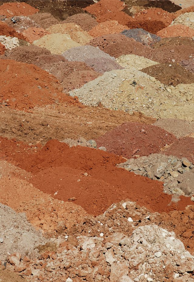Decorative image of bright red colored soil