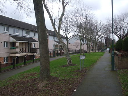 The Radburn layout. Maisonettes on Teak Avenue, on the St Ann's estate, Nottingham the facing houses are on Tulip Avenue. Nottingham. The upper houses are accessed from this walk way, while car access is limited to the crossing roads.