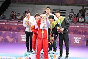 Deutsch: Tischtennis bei den Olympischen Jugendspielen 2018; Tag 9, 15. Oktober 2018; Mixed Medaillenzeremonie - Gold: Yingsha Sun & Wang Chuqin (CHN), Silber: Miu Hirano & Tomokazu Harimoto (JPN), Bronze: Su Pei-ling & Lin Yun-ju (TPE)); Medaillen-Verleiher: IOC member Ryu Seung-minu (KOR), Maskottchen-Verleiher: ITTF Vice-Presiden Nestor Tenca (ARG) English: Table tennis at the 2018 Summer Youth Olympics at 15 October 2018 – Mixed Medal Ceremony - Gold: Yingsha Sun & Wang Chuqin (CHN), Silver: Miu Hirano & Tomokazu Harimoto (JPN), Bronze: Su Pei-ling & Lin Yun-ju (TPE)); Medal presenter: IOC member Ryu Seung-minu (KOR), Mascot presenter: ITTF Vice-Presiden Nestor Tenca (ARG)