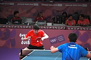 Deutsch: Beachhandball bei den Olympischen Jugendspielen 2018; Tag 4, 9. Oktober 2018; Mädchen, Finale – Tomokazu Harimoto (JPN) Vs Wang Chuqin (CHN) 1:4 English: Table tennis at the 2018 Summer Youth Olympics at 9 October 2018 – Girl's Singles Final – Tomokazu Harimoto (JPN) Vs Wang Chuqin (CHN) 1:4