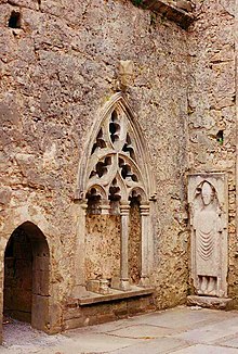 The Gothic sedilia in the chancel of Kilfenora Cathedral The Gothic sedilia in the chancel of Kilfenora Cathedral.jpg