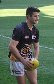 Cotchin warming up before a match in 2013. Trent Cotchin warm-up (cropped).jpg