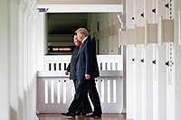 Trump and Kim walking in the corridor