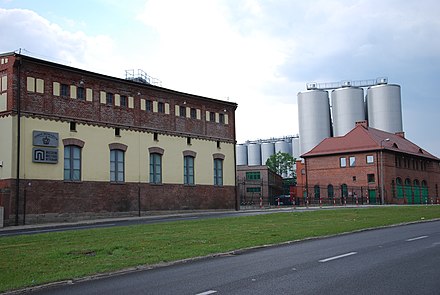 Brewery in Tychy on the right, Tyskie Brewing Museum on the left