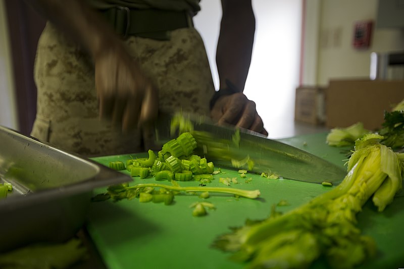 File:U.S. Marine Corps Lance Cpl. Justin Brown, a legal clerk with Headquarters Company, III Marine Expeditionary Force Headquarters Group, chops vegetables in the dining facility at Camp Mujuk, South Korea 140328-M-UQ794-046.jpg