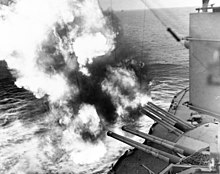 Forward 14/45 guns of Nevada fire on positions ashore, during the landings on "Utah" Beach, June 6, 1944 USS Nevada (BB-36) fire on positions ashore.jpg