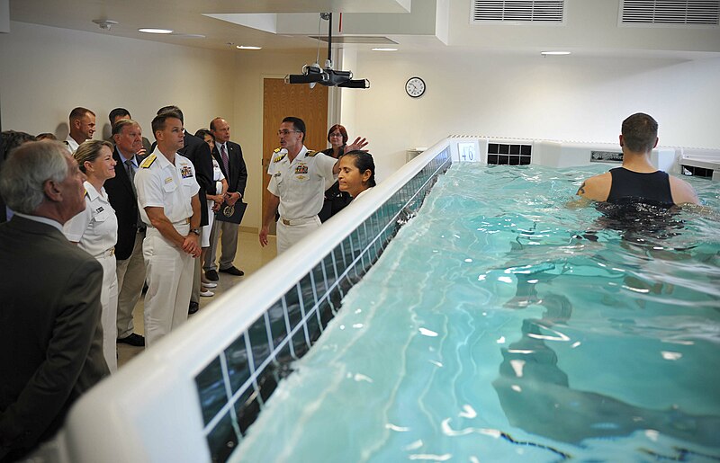 File:US Navy 110907-N-AW702-078 Capt. Lynn Welling, commanding officer of Naval Hospital Jacksonville, gives a tour of the new aquatic treadmill.jpg