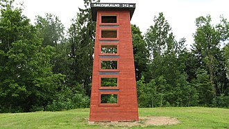 Monument at summit of Gaizinkalns, the highest point in Latvia. It is a model of the observation tower that stood on top of Gaizinkalns until it was demolished in 2012. Veca Gaizinkalna skatu torna replika, 30.07.16 - panoramio.jpg