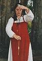 Viking woman spinning the drop spindle.jpg