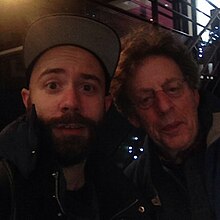 Woodkid and Philip Glass after their conference about New York Minimalism at the Opera de Saint Etienne in 2014