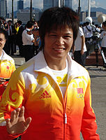 הג'ודאית שיאן דונגמיי, שזכתה במדליות זהב באתונה ובבייג'ינג