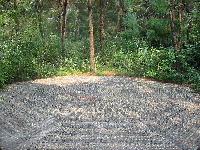 Yin and Yang symbol with the bagua symbols paved in a clearing outside of Nanning City, Guangxi province, China