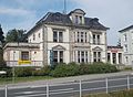 Villa (with veranda extension), garden with well and coach house