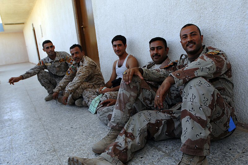 File:090824-A-NU680-005 - Iraqi soldiers relax during a break while attending classes at 24th Brigade, 6th Iraqi Army Training Academy, near Baghdad.jpg